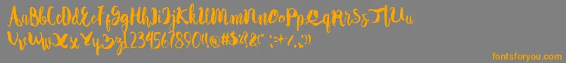 Autodidact Font – Orange Fonts on Gray Background