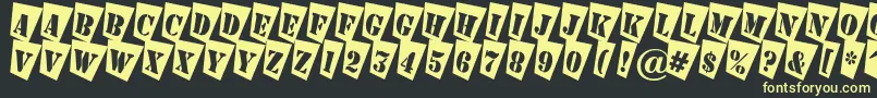 フォントAStampercmtw – 黒い背景に黄色の文字