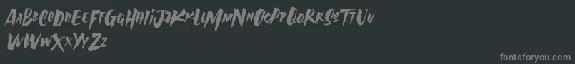 Fonte AvailaBrush Demo – fontes cinzas em um fundo preto