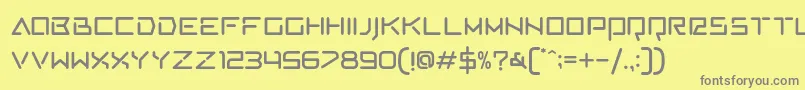AVCosmos Regular-fontti – harmaat kirjasimet keltaisella taustalla