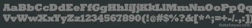 Bigslabhammer-fontti – harmaat kirjasimet mustalla taustalla