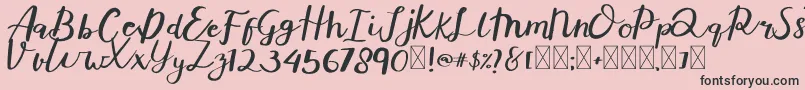 フォントAverto – ピンクの背景に黒い文字