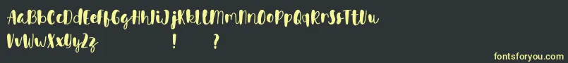 Avinda Font – Yellow Fonts on Black Background