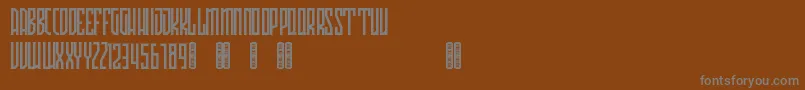 Avriella Free Font – Gray Fonts on Brown Background