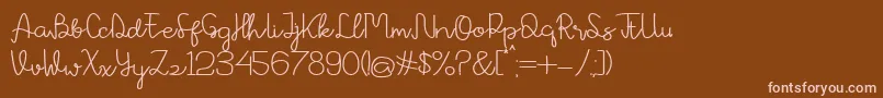 Avrilya Font – Pink Fonts on Brown Background