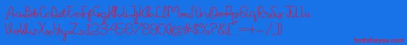 Avrilya Font – Red Fonts on Blue Background