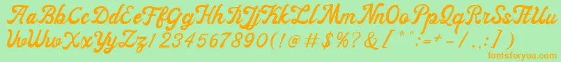 フォントayangduit – オレンジの文字が緑の背景にあります。