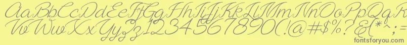 Ayla script Free Demo-Schriftart – Graue Schriften auf gelbem Hintergrund