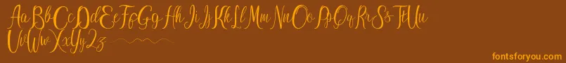 ayu widya Font – Orange Fonts on Brown Background