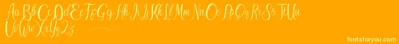 ayu widya-Schriftart – Gelbe Schriften auf orangefarbenem Hintergrund