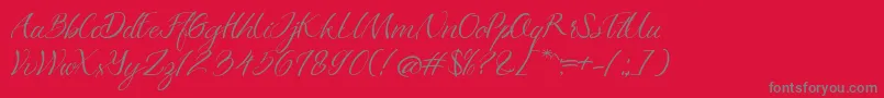 Azkadina Dafont Font – Gray Fonts on Red Background