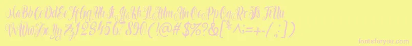 Azkanio Script Font – Pink Fonts on Yellow Background