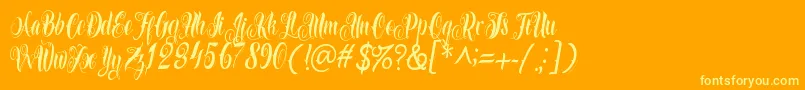 Azkanio Script Font – Yellow Fonts on Orange Background