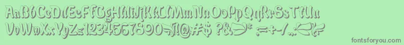 フォントBabaluShade – 緑の背景に灰色の文字