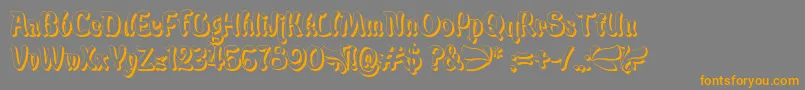 フォントBabaluShade – オレンジの文字は灰色の背景にあります。