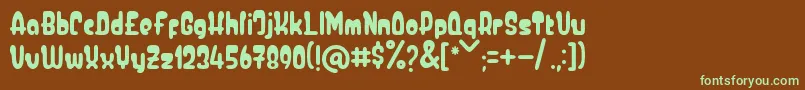 フォントBaby Boo – 緑色の文字が茶色の背景にあります。