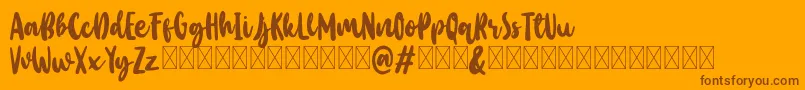 Baby Wildy Personal Use-fontti – ruskeat fontit oranssilla taustalla