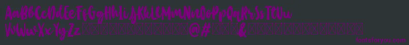 Шрифт Baby Wildy Personal Use – фиолетовые шрифты на чёрном фоне