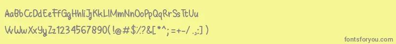 fuente Babyground – Fuentes Grises Sobre Fondo Amarillo