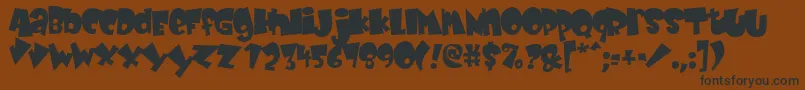 BABYK    Font – Black Fonts on Brown Background