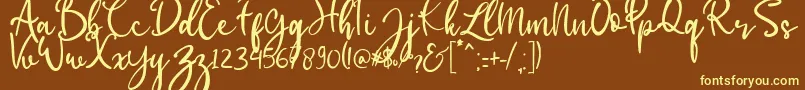 babylittle-fontti – keltaiset fontit ruskealla taustalla