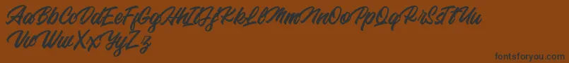 Backhill Free Version Font – Black Fonts on Brown Background
