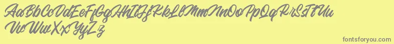 Backhill Free Version Font – Gray Fonts on Yellow Background