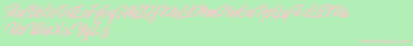Backhill Free Version-fontti – vaaleanpunaiset fontit vihreällä taustalla