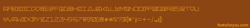 フォントBacotu – オレンジ色の文字が茶色の背景にあります。