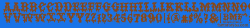 フォントBAD MOTHER FUCKER – 茶色の文字が青い背景にあります。
