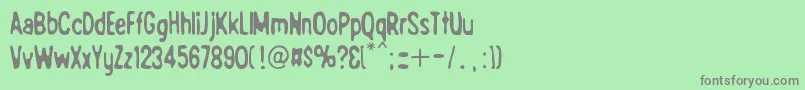 フォントBad Quality – 緑の背景に灰色の文字