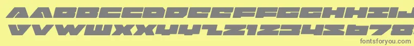 badaxeexpandital-fontti – harmaat kirjasimet keltaisella taustalla