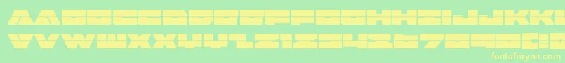 フォントbadaxelaser – 黄色の文字が緑の背景にあります