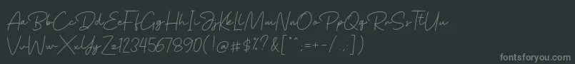 Шрифт BagindaScript – серые шрифты на чёрном фоне