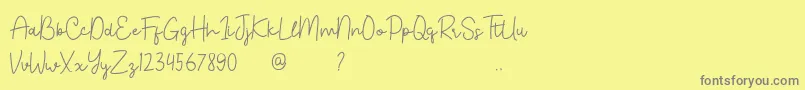 Bahary-Schriftart – Graue Schriften auf gelbem Hintergrund