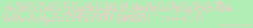 Bahuraksa Font – Pink Fonts on Green Background