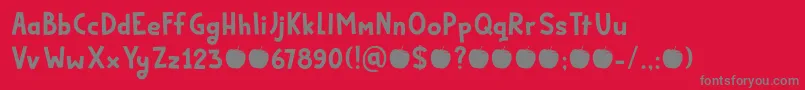 Fonte Bakeapple DEMO – fontes cinzas em um fundo vermelho