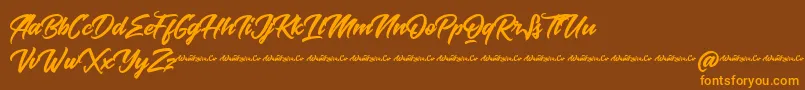 Baksoda Demo-Schriftart – Orangefarbene Schriften auf braunem Hintergrund