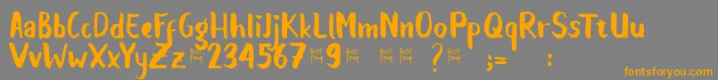Balalak dafont-Schriftart – Orangefarbene Schriften auf grauem Hintergrund