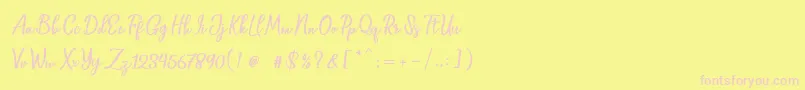 Baleria Script-Schriftart – Rosa Schriften auf gelbem Hintergrund