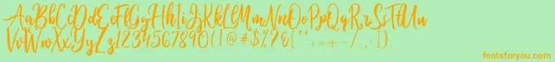 Ballada Font – Orange Fonts on Green Background