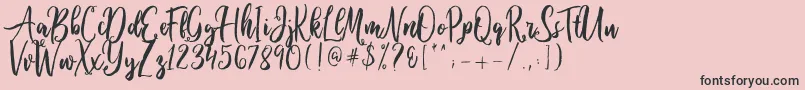 Fonte Ballada – fontes pretas em um fundo rosa
