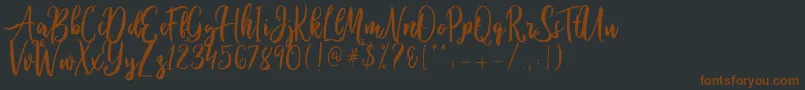 Ballada Font – Brown Fonts on Black Background