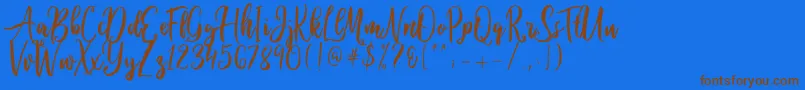 Ballada Font – Brown Fonts on Blue Background