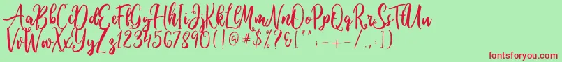 Ballada Font – Red Fonts on Green Background