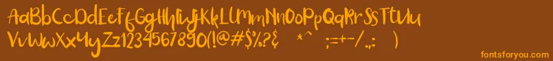 Ballete Font – Orange Fonts on Brown Background