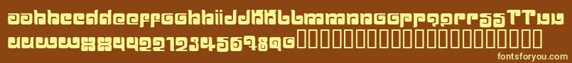 BALLOM  -fontti – keltaiset fontit ruskealla taustalla