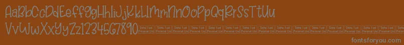 Balloon Bash Demo Font – Gray Fonts on Brown Background