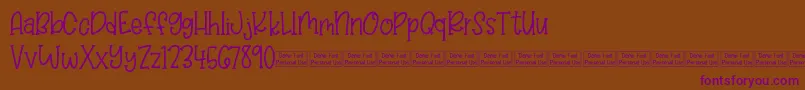 Balloon Bash Demo Font – Purple Fonts on Brown Background