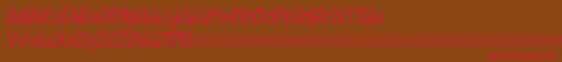 Balloon Bash Demo-Schriftart – Rote Schriften auf braunem Hintergrund